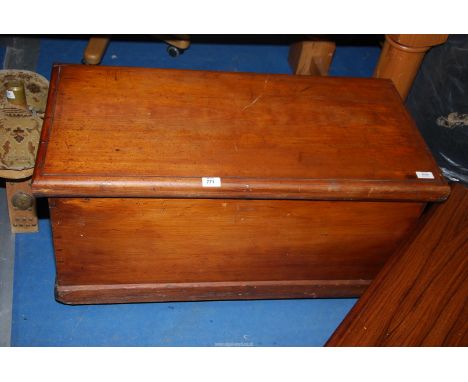 A wooden trunk - 35" x 17" x 19" high.