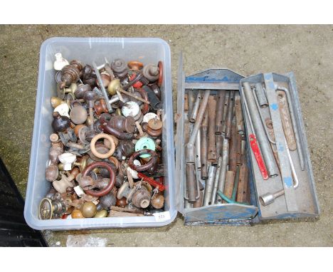 Toolbox containing box spanners and wheel braces, plus wooden and brace door knobs.