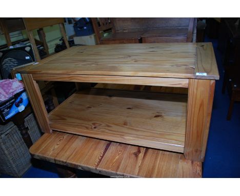 A Pine coffee table with lower shelf 42'' x 23 1/2'' x 18'' high.