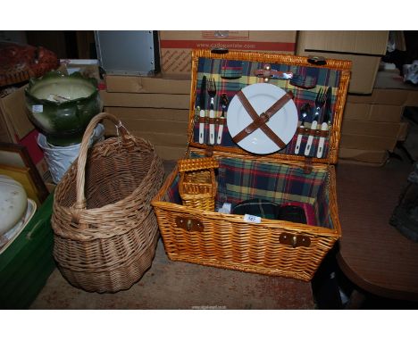 A picnic hamper basket including contents and a shopping basket.