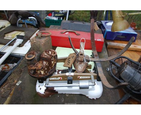 An 'Avery Berkel' scale with weights and a flat iron.