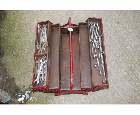 A cantilever tool box with ring and open-end spanners.