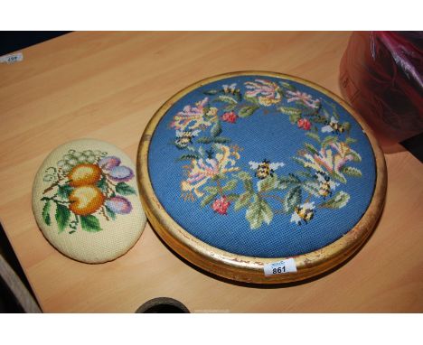A tapestry footstool plus a tapestry plaque.