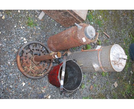A vintage fire extinguisher, a galvanised red bucket, umbrella stand, plus a fuel container with tap.