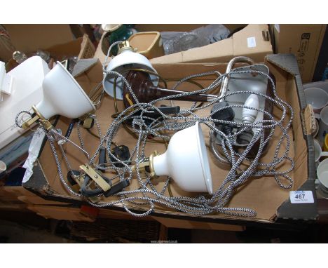 A 'Bakelite Banker's' desk lamp, and three desk clamp lamps.