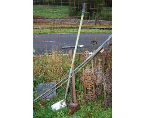 An axe, a hoe, and a lawn edger.
