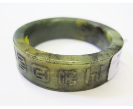 A multicoloured jade bangle