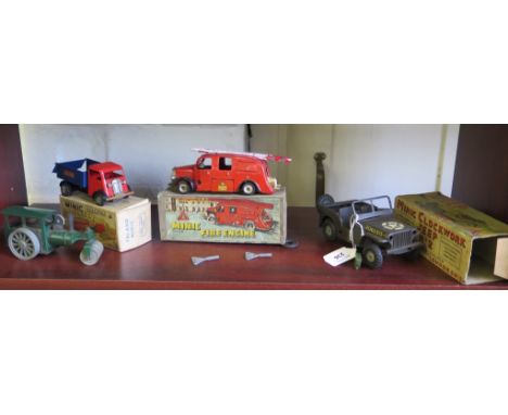 A Minic clockwork Jeep No.2, with box, Minic fire engine with box, Minic short bonnet red and blue tipper with box, and green