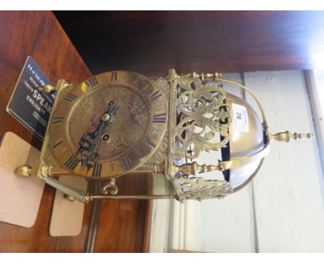 An 18th century style brass lantern clock by John Walker 77 Cornhill and 230 Regent Street, London, the case with two bells o