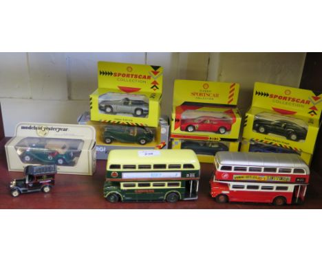 Seven boxed die-cast model cars, including Maisto supercar collection, Shell sports car collection and a Models of Yesteryear