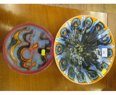 Poole Pottery 27cm diameter bowl and another 18cm diameter bowl with incised decoration around outer rim, both Delphis range