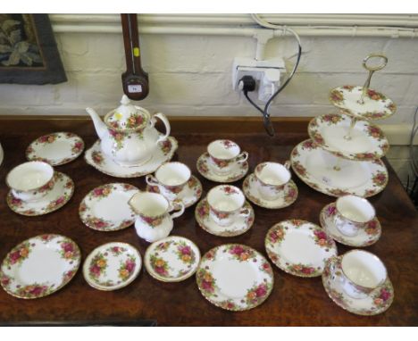 A Royal Albert Old Country Roses pattern tea service, for six settings, including three tier cakestand
