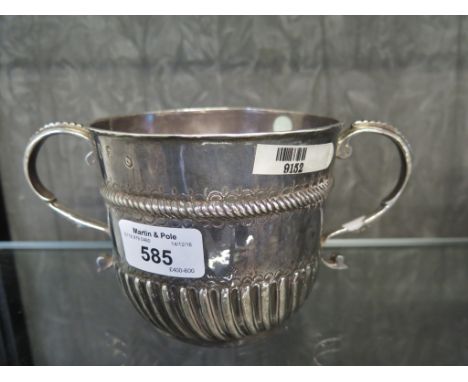 A 17th Century silver porringer of ribbed decoration, London 1699/1700 by Isaac Dighton. This item has been before The Goldsm