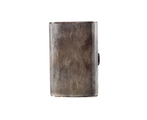 ENGINE TURNED SILVER OBLONG COMPACT/CARRY ALL,the hinged cover revealing an interior with powder compartment, lipstick holder