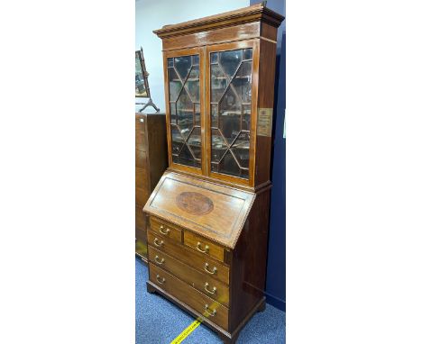 EARLY 20TH CENTURY MAHOGANY BUREAU BOOKCASE, with moulded cornice above two astragal glazed doors enclosing shelving, the fal