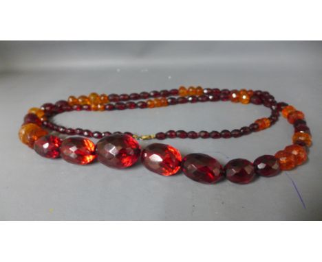 An amber and mixed bead faceted necklace - Length approx 112cms - Total weight approx 89.8gms
Condition Report: Good - The li