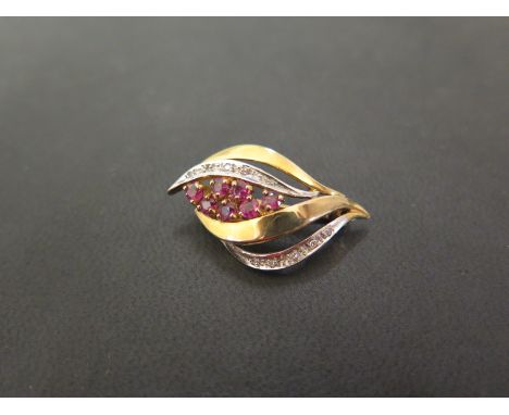 A 9ct gold ruby and diamond foliate brooch - Partial hallmark - Width 3.1cms - Weight approx 3.4gms
Condition Report: Good - 