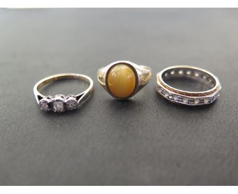 An old-cut diamond three-stone ring - Stamped 18ct and plat - Ring size M - Together with an 18ct gold white-gem full circle 