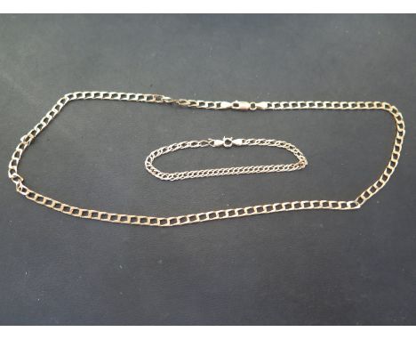 A curb-link chain - Stamped 9K - Length 51cms - Together with a 9ct gold fancy-link bracelet - Hallmarked Sheffield - Length 