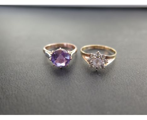 Two gem-set rings - To include an amethyst single-stone ring, size L - Together with a white-gem cluster ring, size O 1/2 - B