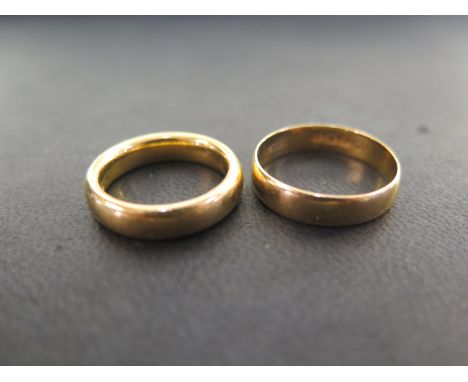 Two 22ct gold band rings - Hallmarked London and Birmingham - Ring size L 1/2 and R - Total weight approx 13.3gms
Condition R