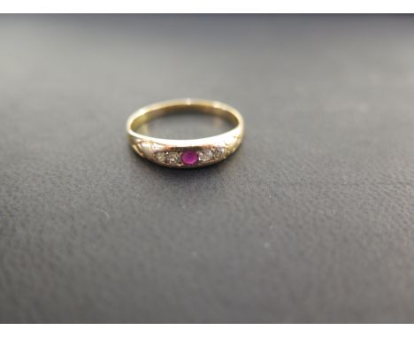 A ruby and diamond dress ring - Stamped 18 - Ring size P - Weight approx 2.3gms
Condition Report: Good to fair - With light s