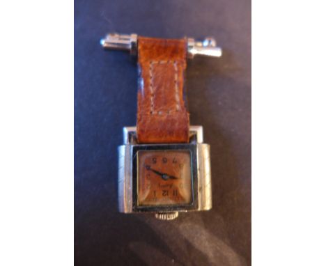 A 1950's stainless steel Asprey Hunting watch having transverse dial with Roman numerals and arrow hands, in tank style case 