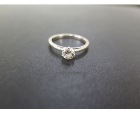 An 18ct gold brilliant-cut diamond single-stone ring - Diamond weight 0.50ct, stamped to band - Estimated J-K colour, P1-P2 c