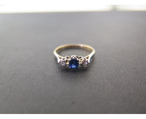 A sapphire and diamond three-stone ring - Stamped 18ct and plat - Ring size N - Weight approx 1.9gms
Condition Report: Good -