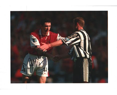 Martin Keown Signed 8x12 Arsenal Photo. Good condition. All autographs come with a Certificate of Authenticity. We combine po