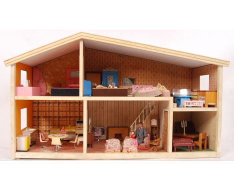 An original vintage 1970's Lundby 6 roomed house along with original Lundby furniture to include; tables, chairs, baths, sink