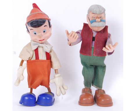 Two vintage 20th century Disney figures of Pinocchio and Geppetto . Made by Marx Toys in Hong Kong.&nbsp;