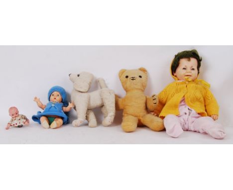 A suitcase of original vintage teddy bears &amp; dolls to include; miniature clockwork baby, large rubber fully clothed doll,