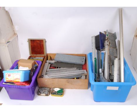 A large collection of original vintage Meccano to include; black &amp; silver straights, red and blue squares, tubs of washer