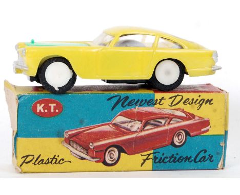 An original Friction Cars K.T Plastic Car 126. Yellow sports car with lime green bonnet. Within original box.&nbsp;

POSTAGE: