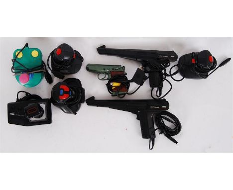 A collection of 1980/90's game controllers including Sega Light Phaser, Gun controllers, Sega Control Sticks etc.&nbsp;

POST