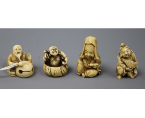 Two Japanese ivory netsuke of old men and two ivory okimono of immortals, late 19th/early 20th century