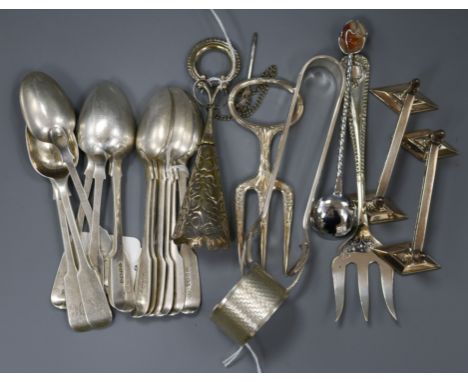 Thirteen silver fiddle pattern teaspoons, a napkin ring and sundry small silver and plated flatware, the teaspoons comprising
