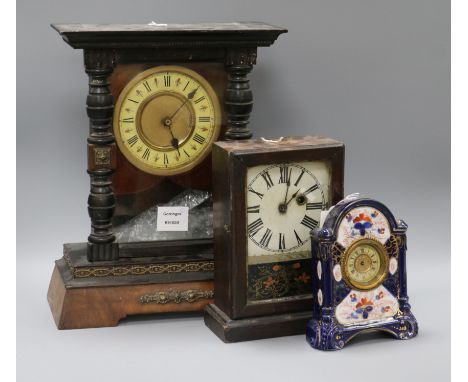 A late 19th century German eight day mantel timepiece in an ebonised and walnut case and two other small timepieces (3) talle
