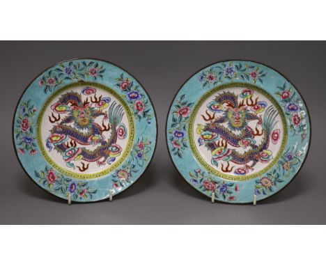 A pair of Chinese Guangzhou enamel 'dragon' dishes diameter 19cm