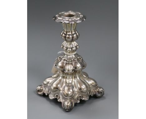 An ornate continental white metal candlestick, loaded, 18.3cm.