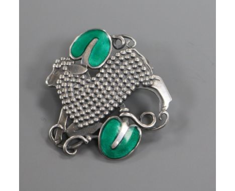 A Danish Georg Jensen sterling silver and enamel sheep brooch, no 284, 33mm.