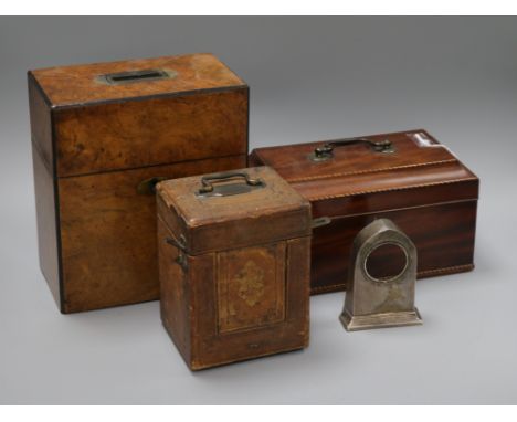 A George III tea caddy, a Victorian decanter box, a carriage clock case and a silver watch frame (4)