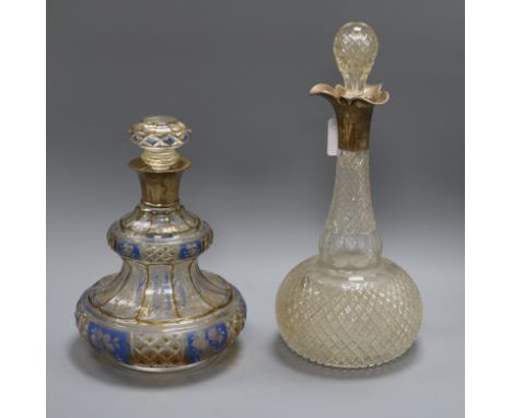 A Bohemian silver mounted blue and clear glass flash cut decanter and one other silver mounted decanter tallest 36cm