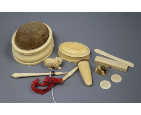 A collection of mixed ivory including a netsuke, pin tray and a cheroot holder