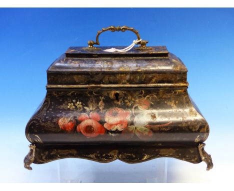 AN EARLY VICTORIAN TOLE TEA CADDY PAINTED WITH FLOWERS ON A GILT BLACK GROUND, THE INTERIOR WITH TWO CANNISTERS FLANKING A BO