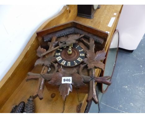 A VINTAGE CUCKOO CLOCK. 