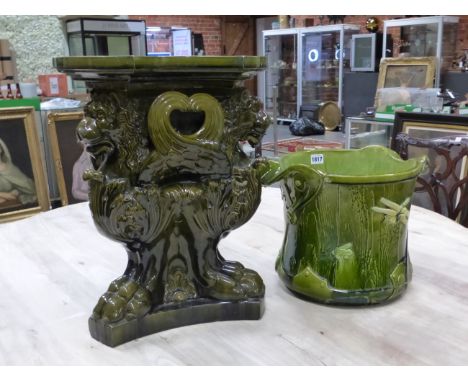 A BRETBY PLANTER MOULDED IN RELIEF WITH A DRAGON FLY AND A FLOWER ON THE GREEN FAUX BOIS GROUND.   H 27cms. TOGETHER WITH A G