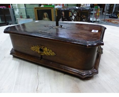A GERMAN VINTAGE POLYPHON IN A STAINED WOOD CASE AND PLAYING 18cms. METAL DISCS, THE CASE. W 44 x D 28 x H 20cms.