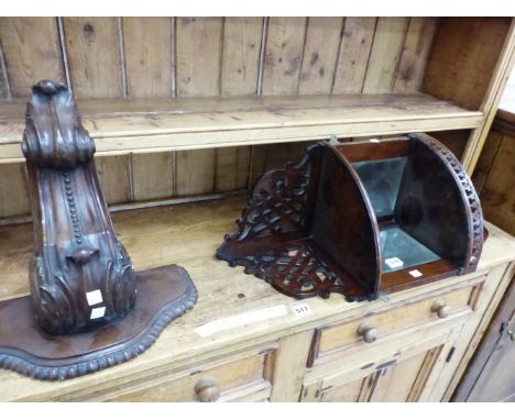 A EDWARDIAN MIRRORED MAHOGANY CORNER SHELF. H 66cms. TOGETHER WITH A FOLIATE CARVED MAHOGANY WALL BRACKET